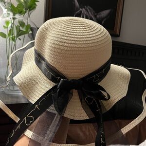 Elegant Cream Sun Hat with Black Ribbon